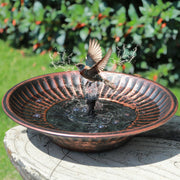 AIHAOKAN front view of copper bird bath bowl showing elegant garden placement and attraction