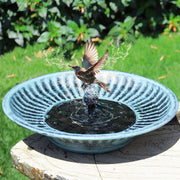 AIHAOKAN metal bird bath front view showing basin and solar pump, attracts birds