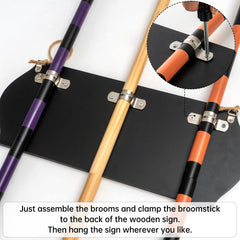 AlevaHive metal buckle detail securing broom handles offering reliable storage and easy removal
