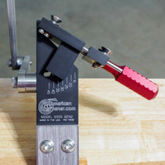 All American Sharpener with cordless grinder in use for portable field sharpening