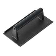Amazon Basics cast iron press front view showing sturdy rectangle and even searing benefit