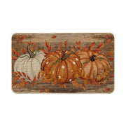 Artoid Mode front view of fall doormat showing pumpkin design and welcoming pattern benefit: seasonal curb appeal