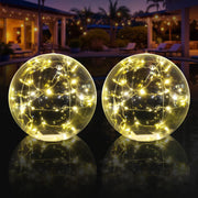 Askyli front view of two 15-inch floating lights showing warm white glow and packaging benefit