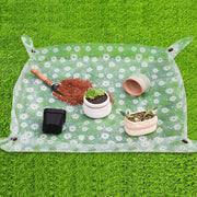 Azureblue front view of clear repotting mat showing size and shape, protects surfaces