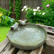 Bakayoyo front view of green ceramic bird bath showing shallow basin benefit
