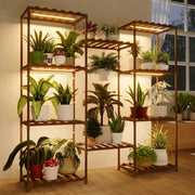 Bamworld plant stand front view showing ten wooden shelves and multiple pots