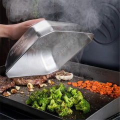 Blackstone cover beside spatula showing 10x10 scale for proper fit