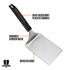 Blackstone spatula in use smashing burger on griddle showing control and benefit: consistent patties
