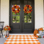 CAINANEL front porch overview showing orange buffalo plaid welcoming guests