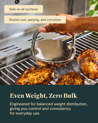 Caraway grill press on cast iron pan demonstrating faster, consistent searing