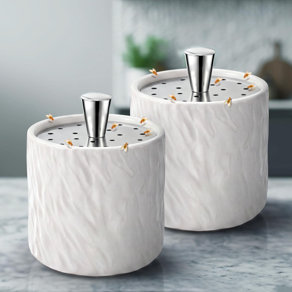 CimoroWin front view of two ripple ceramic traps showing clean kitchen styling and subtle containment