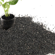 CJGQ front bag of black lava rocks showing packaged product and benefits