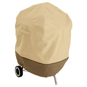 Classic Accessories front view of cover protecting kettle grill with water resistance