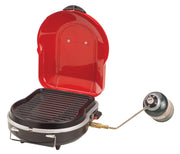 Coleman fold 'n go front view showing compact grill and handle, easy transport