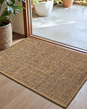 Color&Geometry front view of 24x36 jute rug showing warm welcome