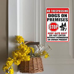 CONHUIDF sign mounted on a wooden gate showing practical placement benefit: boundary marking