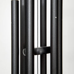 Corinthian Bells hanging on a patio showing placement and ambiance benefit: enhances outdoor space