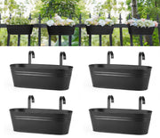 Dahey front view of four black railing planters showing neat plant rows and neat fit