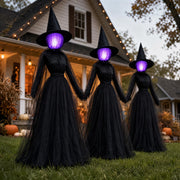 Dazzle Bright front view of three 6ft witches creating a spooky yard focal point