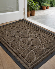 DEXI front door mat front view showing floral groove trapping debris