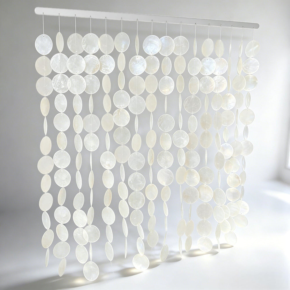 DHHOUSE front view of capiz shell wall hanging highlighting elegant coastal focal point