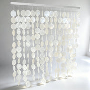 DHHOUSE front view of capiz shell wall hanging highlighting elegant coastal focal point