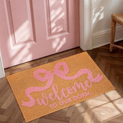 Dunzy front view showing pink bow design and welcoming entrance benefit