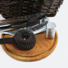 Esie Houzie brush scrubbing hot grill grates for quicker grease removal benefit