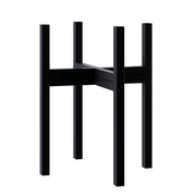 FaithLand front view of black metal plant stand showing clean mid-century silhouette and stability