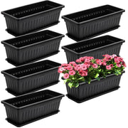 Fasmov front view of seven black window boxes protecting balcony surfaces