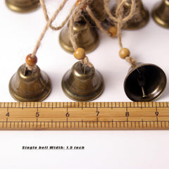 Fishknow close-up of antique bronze bell, detailed finish and clear tone