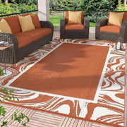 Garvee front view orange white 6x9 rug showing bold stripes and outdoor benefit