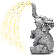 GIGALUMI front view of elephant statue with twinkling LEDs for charming lighting