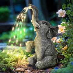 GIGALUMI elephant front view showing LED water effect and decorative charm