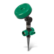 GILMOUR sprinkler front view showing spike base and head, clear placement benefit