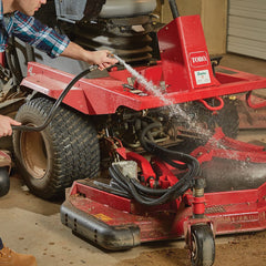 GILMOUR nozzle spraying patio demonstrating reliable cleaning power