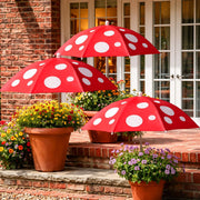 Gilprop front view of three umbrellas showing coverage and color options