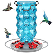Grete Gotye front view of blue glass feeder showing elegant shape and capacity