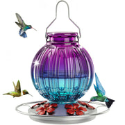 Grete Gotye front view showing glass globe and colorful base attracts birds