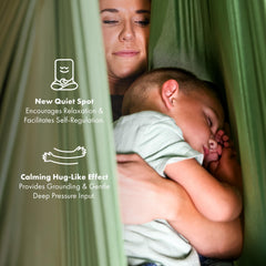Harkla adult using sensory swing demonstrating soothing compression benefit