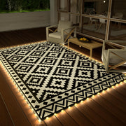 HAUSHOF front view showing mat laid flat and LED lighting for evening use
