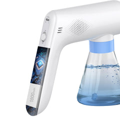 HOLDWELL handheld fogger in hand to show portable size and convenience