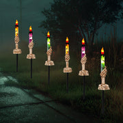 Hourleey front view of 10-pack skull candle stakes showing complete set benefit