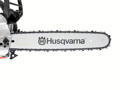 Husqvarna X-Cut next to ruler and bar showing 18 inch scale for correct fit confirmation