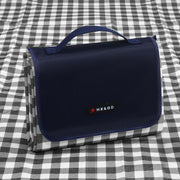 HX&OD front view of blue picnic blanket showing full surface and pattern, highlights coverage