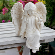 JARPSIRY front view of angel statue showing serene pose and outdoor charm
