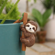 JARPSIRY sloth front view on pot rim adding cute plant charm