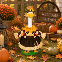 JcHrmers goose styled on porch with pumpkins creating welcoming display