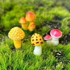JKanruh miniature mushrooms used on a cake display for decorative effect