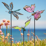 Juegoal front view of three stakes providing colorful garden accent